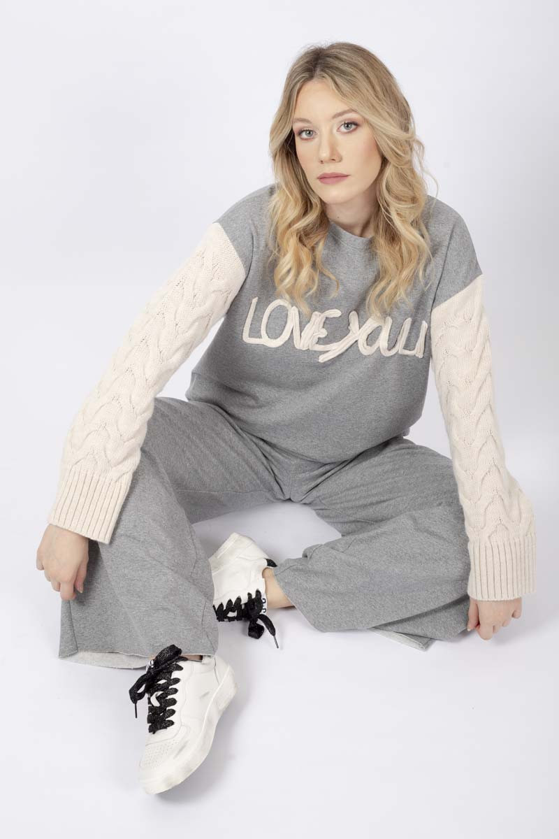 Gray sweater with raised lettering