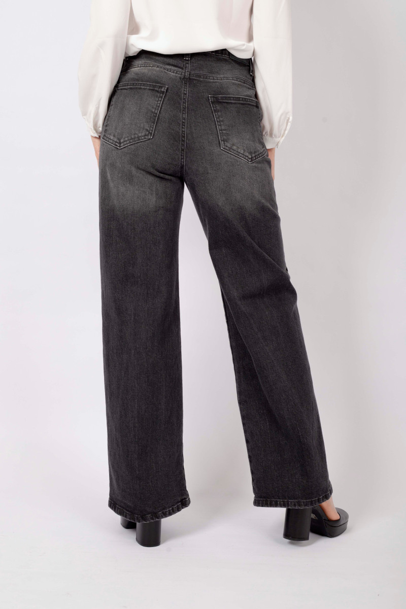 Black palazzo jeans with brooch