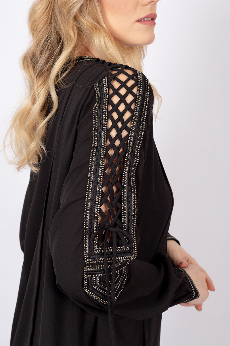 Black blouse with cut-out embroidery