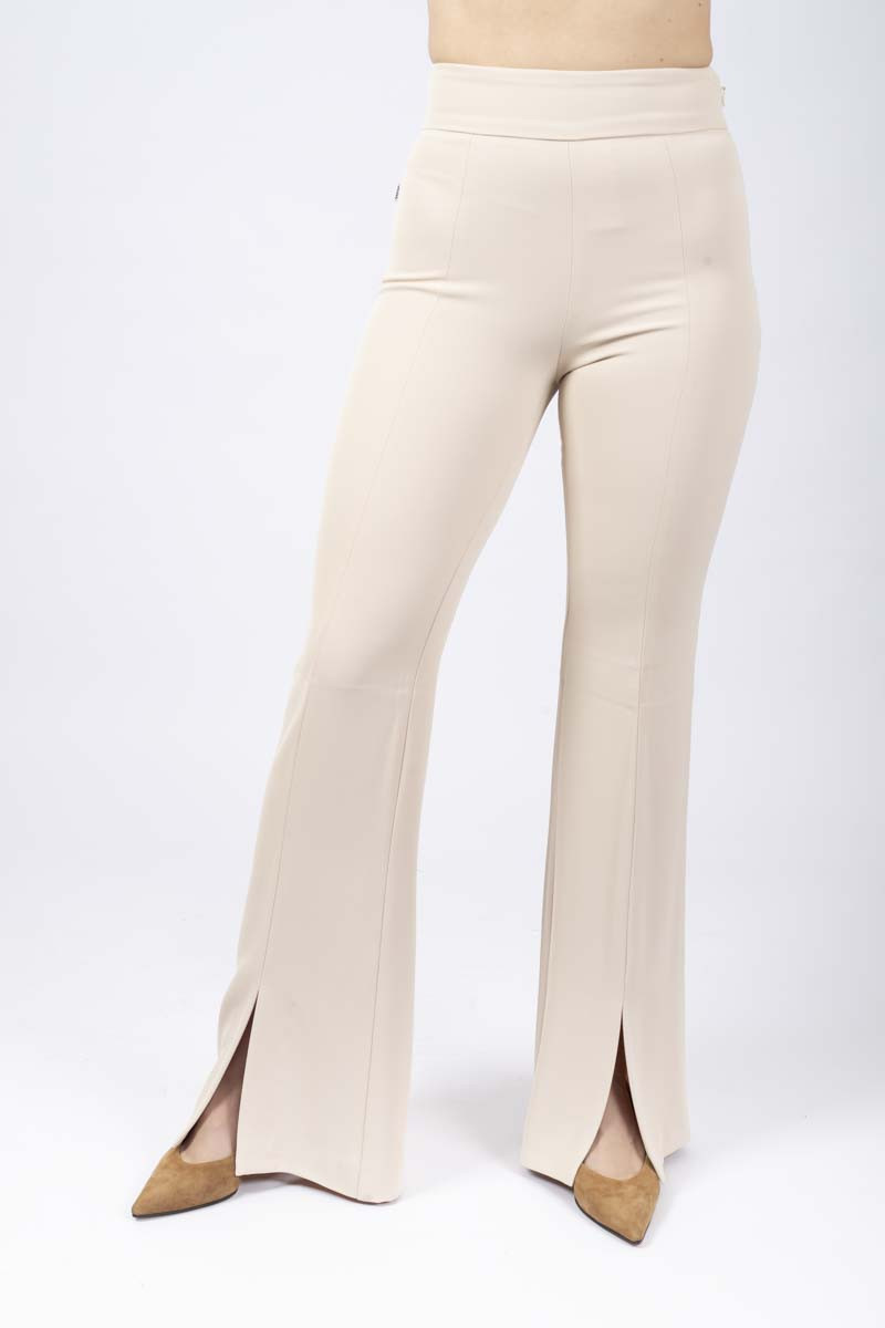 Ivory flare pants with slit