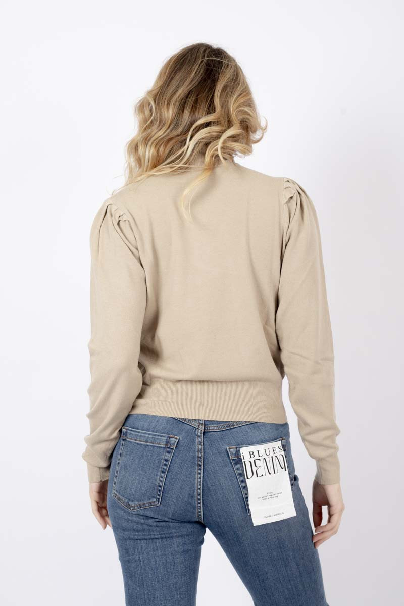 Camel turtleneck sweater